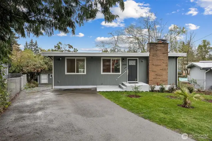 Spacious driveway providing convenient off street parking and easy access to the home.