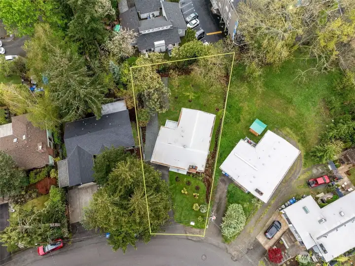 Stunning sunset aerial highlighting the home’s desirable location within a quiet, tree lined community close to parks, schools, and amenities.