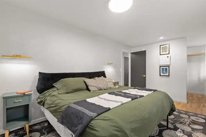 Primary bedroom with spacious walk-in closet at right