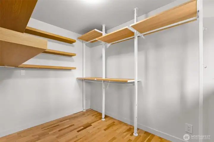 Walk-in closet in primary bedroom has tons of space