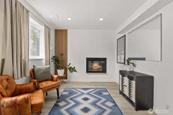 Third bedroom is on the ground floor, adjacent to the rec room space.