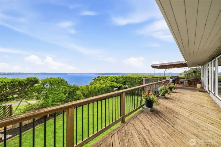 The deck runs the length of the home.