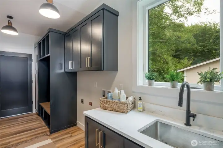 First floor laundry/mud room- Farmstyle built in for coats, shoes and boots.