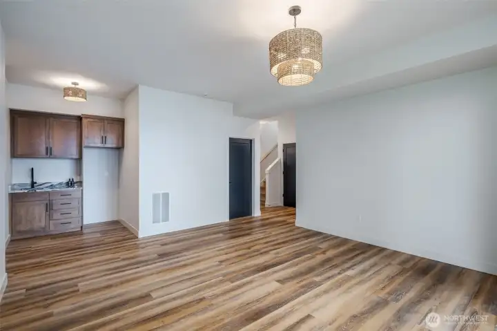 Bonus room downstairs opens to the firepit area