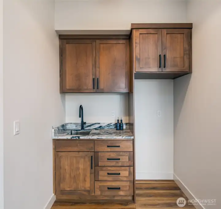 Bonus room wet bar area w/room for refrigerator