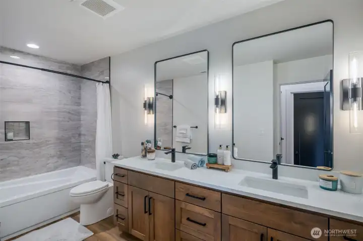 LARGE downstairs bathroom w/washer & dryer area plus big linen closet