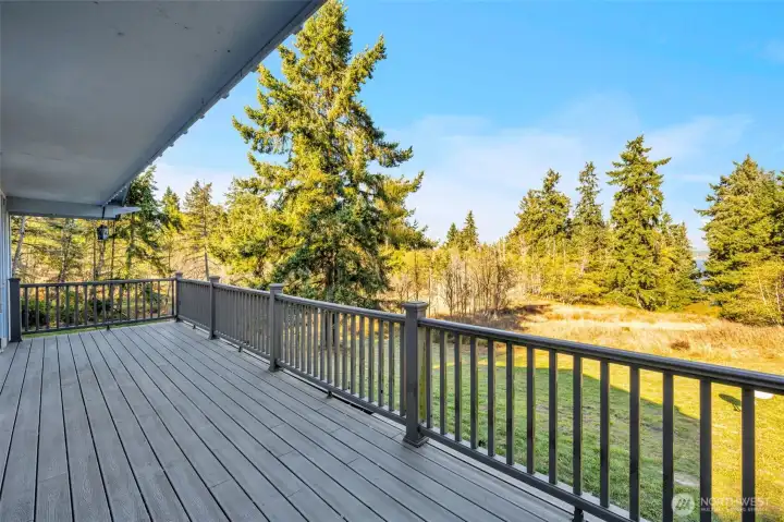 Enjoy a beverage and bite on the large deck