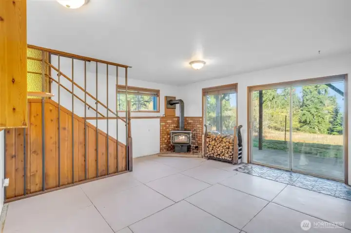 Step through the slider to the expansive back yard
