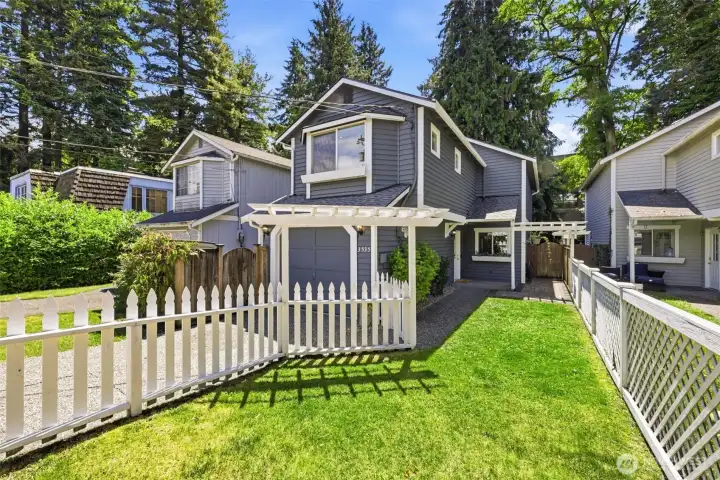 Yard with white picket fence. Yard with white picket fence.