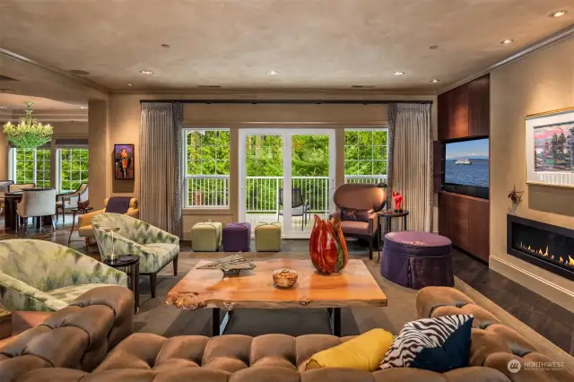 Relax by the cozy, warm fireplace as you gaze into the enchanting woods, alive with the songs of birds