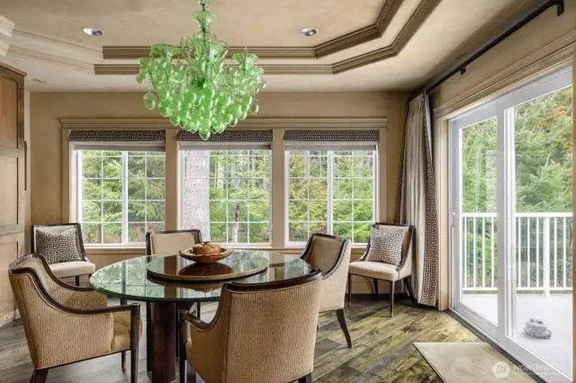 Two large sliders that spans the lenght of the home overlooking the protected forest.