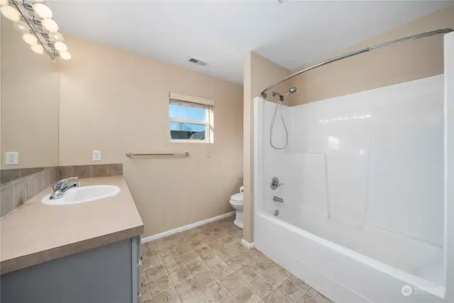 Upstairs full bath with tub