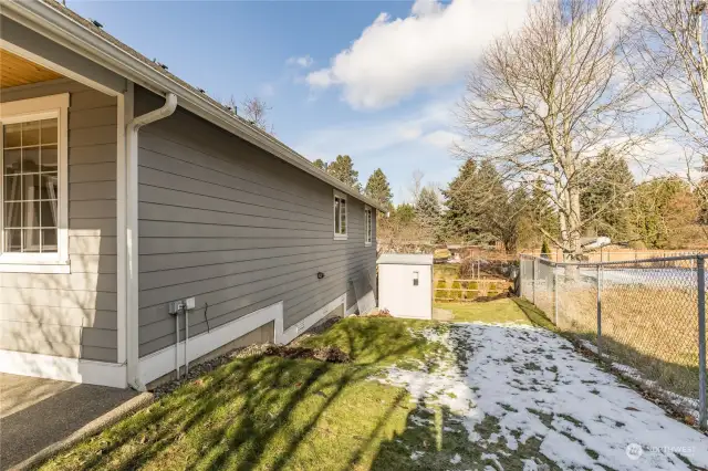 Side yard with garden shed