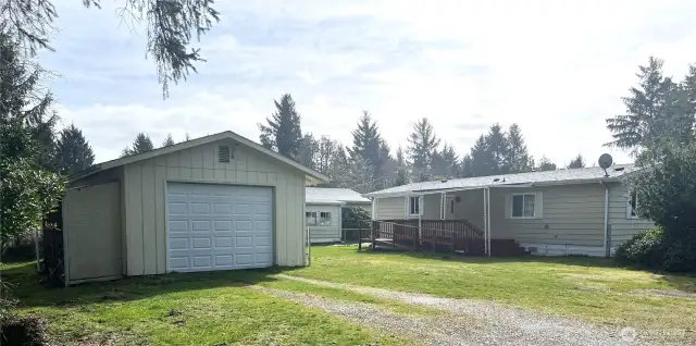 2 bedroom, 2 bath, corner lot home in a quiet neighborhood with detached garage/shop.
