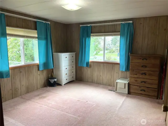 Primary bedroom with lots of space and great windows.