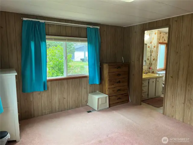 From primary bedroom to primary bathroom.