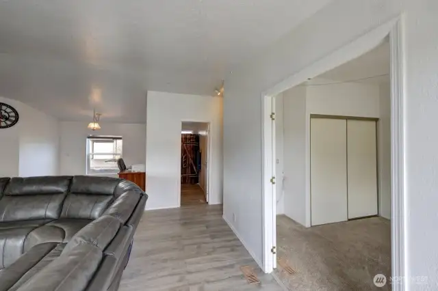 From the main entrance looking into the dining room, bathroom #2 and bedroom #3