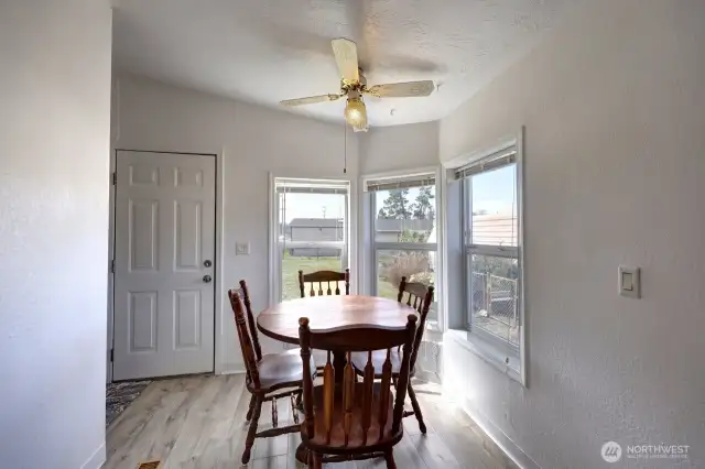 Dining room and door to the rear patio. the laundry room is off to the left.