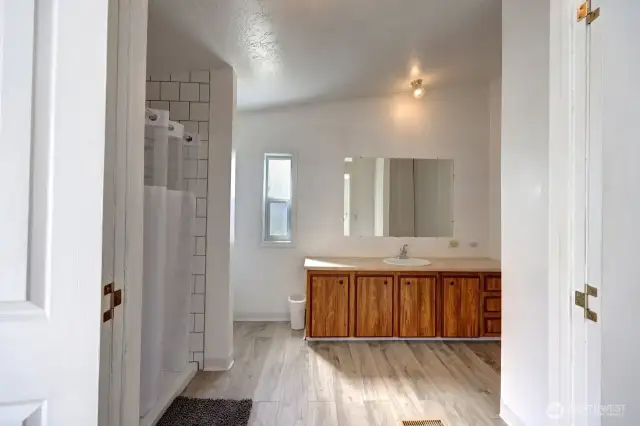 Primary bathroom with large walk in shower.