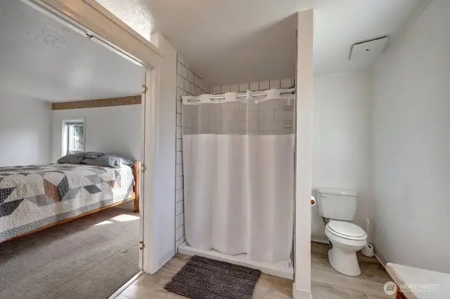 Primary bathroom with large walk in shower.
