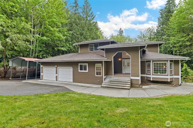Welcome Home to this his Redmond treasure located in a clearing surrounded by trees ~ so private and peaceful, yet minuites to DT Redmond.
