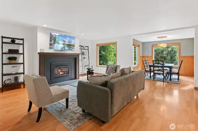 Your spacious family room like the rest of the home is light and bright and yet you see green everywhere you like.  Truly a magnificent setting. Curl up by the gas fireplace on cool Northwest evenings.