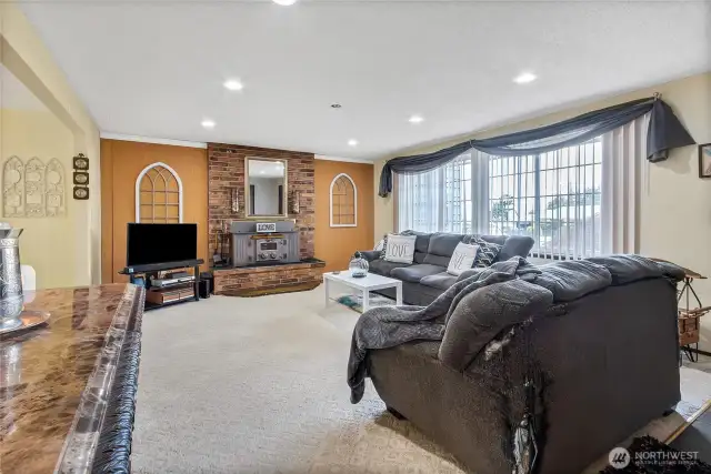 Living Room, Wood stove insert is very efficient.