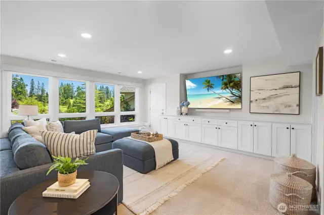 Large, lower level bonus room with built-in cabinetry. Even the bonus room has views of the golf course!
