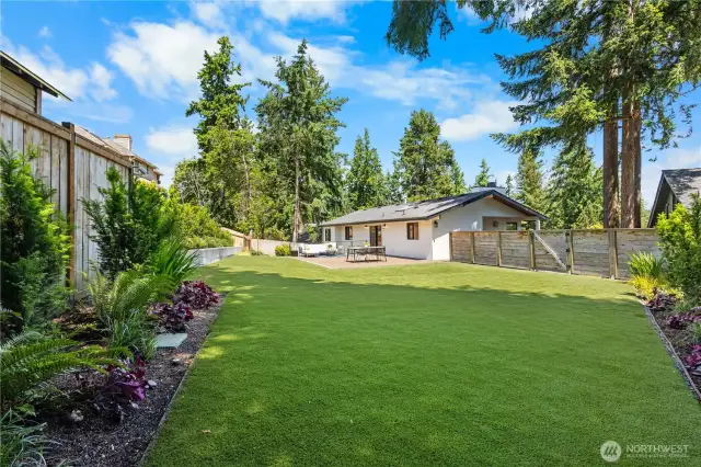 The perfect, flat, low-maintenance yard just in time for summer! Dream Turft installed in 2022.