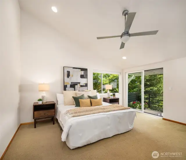 Primary Bedroom w Vaulted Celings & Deck