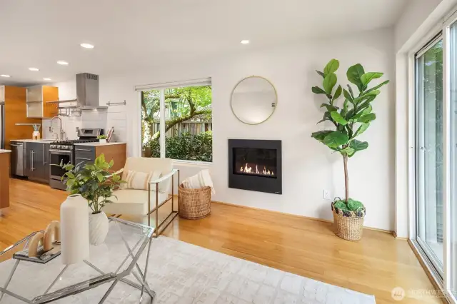 Living Room Open to the Epicurean Kitchen w Gas Fireplace
