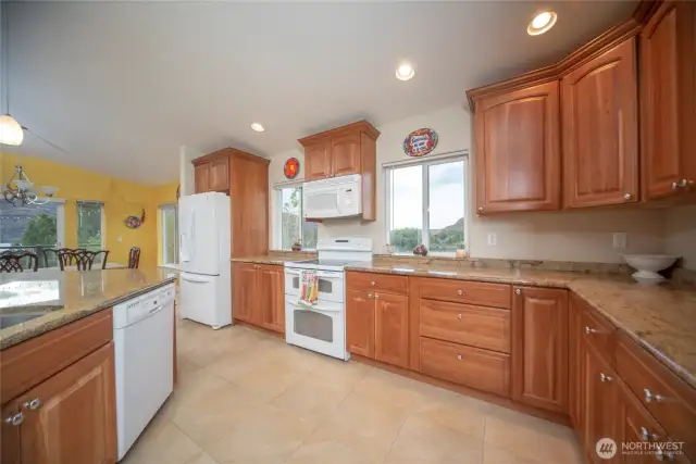 Huge gourmet kitchen. Granite counters and lots of custom cabinets.