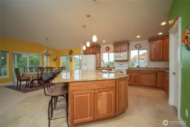 Large granite island for entertaining, seats 6.