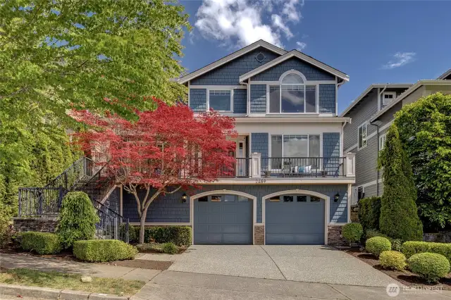 Perched above the street for maximum privacy, this home captures stunning mountain and territorial views. A welcoming front porch sets the tone for relaxed, elevated living.