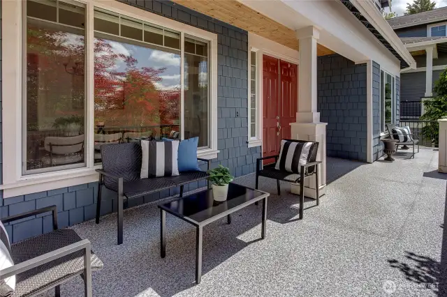 The charming front porch entry sets the tone for relaxed, comfortable living—perfect for greeting guests, starting your day with coffee, or unwinding with a glass of wine as the sun sets.