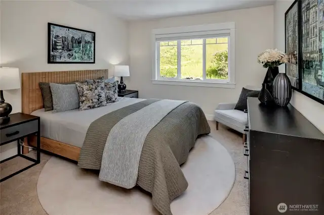 Three additional graciously sized bedrooms offer comfort and flexibility—perfect for family, guests