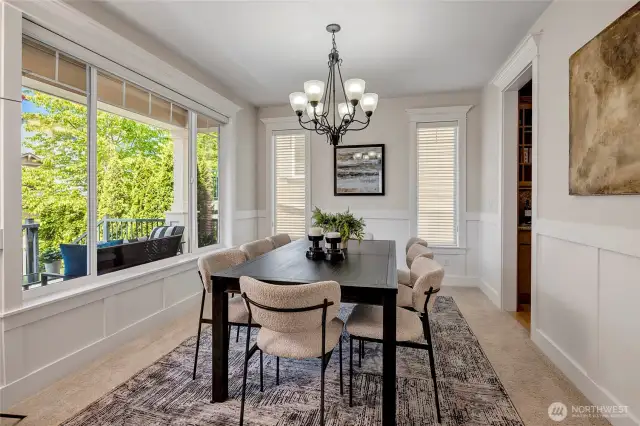 The formal dining room is perfectly sized for both elegant dinner parties and festive holiday gatherings like Thanksgiving—an inviting space to host and celebrate.