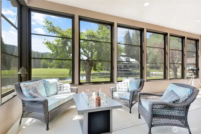 Or sit inside your screened in porch with firepit and enjoy an after dinner beverage.