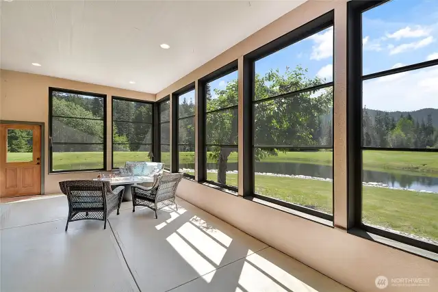 The screened in porch provides year round entertainment.