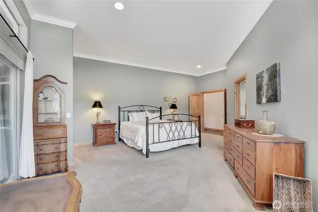 Double doors welcome you into the primary suite.