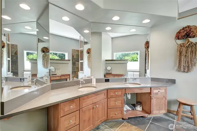 Primary bath will not disappoint! With solid surface countertops, and heated slate floors you have your own personal spa!