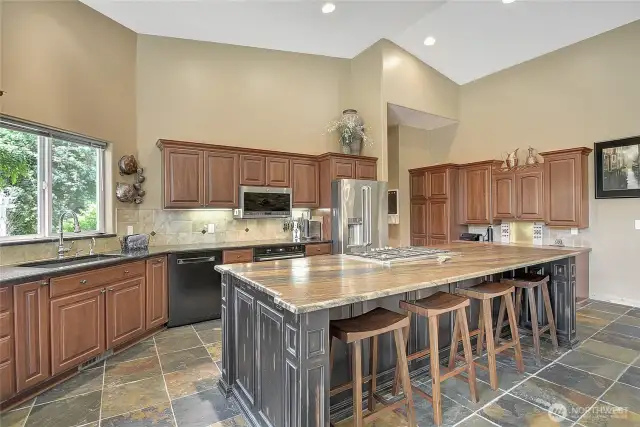 Spacious kitchen has loads of storage and so much counter space you won't know what to do with it!