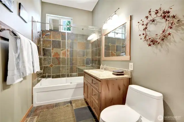 Main bath off the great room is still a complete full bath so even if your hosting large groups plenty of room for everyone.