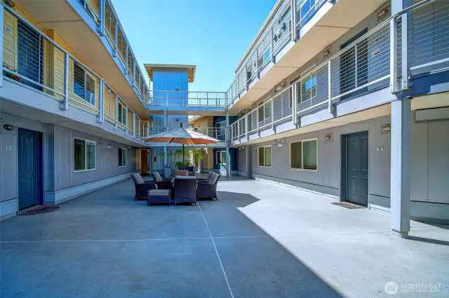 Great centrally located courtyard for gathering with neighbors. Gated & secure.