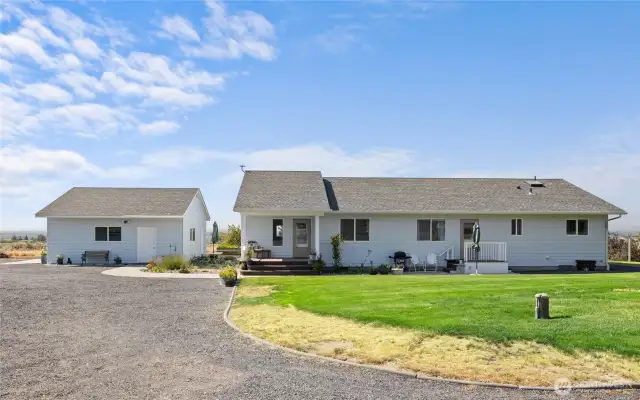 NEW ROOF, curbed landscaping easy to maintain mature landscaping, covered front porch and additional porch!