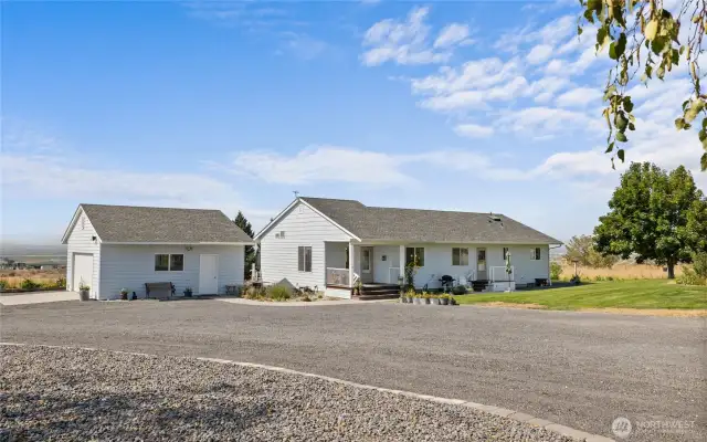 Home and detached two car garage. TONS of parking outside too!