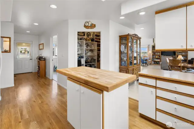 View from kitchen looking into pantry and at second front porch entrance area, right into your kitchen!