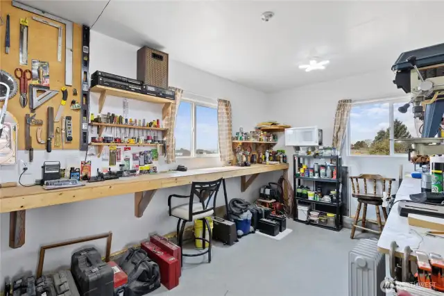 Inside shop work room, office, lots of built ins and storage! AC and Heat too!!!