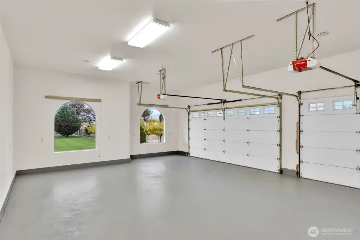 Attached 4 car garage with extra storage