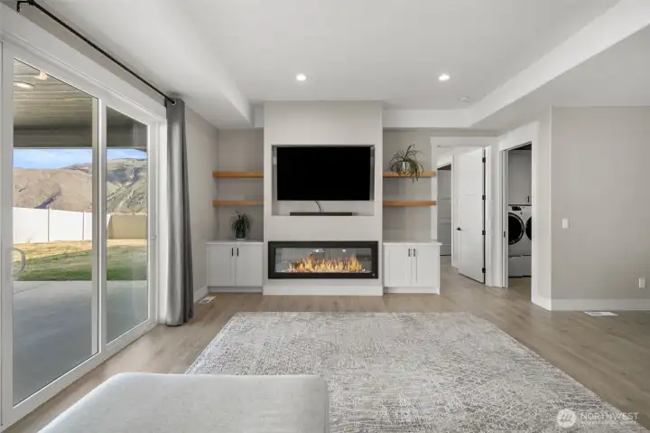 Living room enchanced gas fire place.